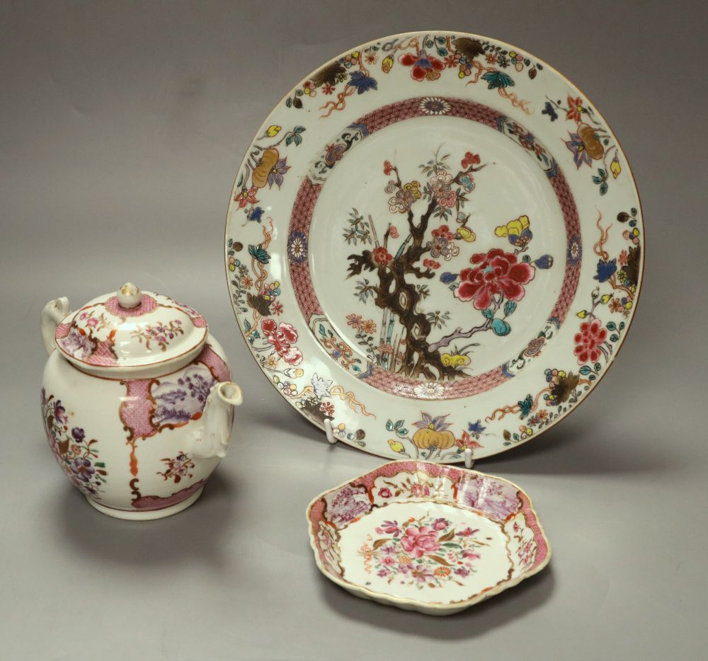 A 18th century Chinese famille rose export plate and an 18th century export teapot, cover and stand (the latter repaired)